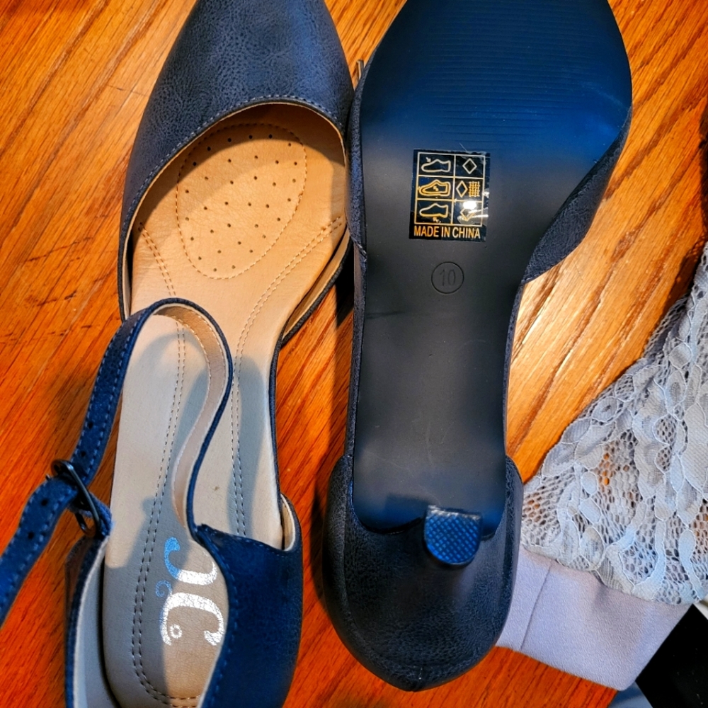Size 10 kitten heels with strap. Brand new, never worn.